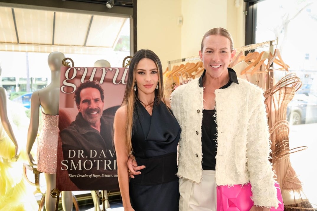 Gurus Media Founder and CEO Derek Warburton poses with television personality Sandra Vergara