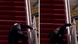 President Biden Trips Going Up Stairs of Air Force One