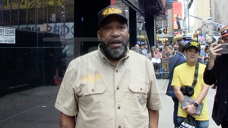 Bun B Hawking Award Winning Trill Burgers at First Ever Hip Hop Food Court