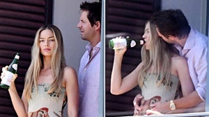 margot robbie tom ackerly launch backgrid