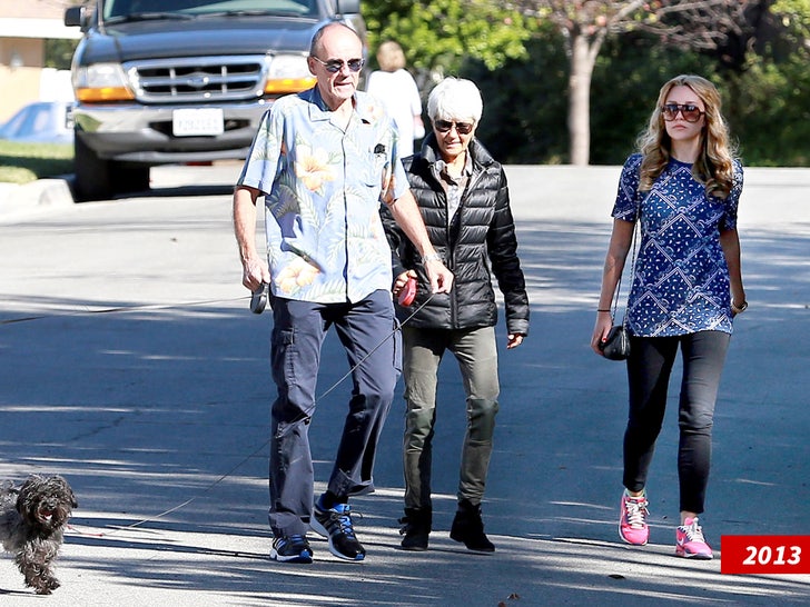 Amanda Bynes walks around New York City with blue scarf covering