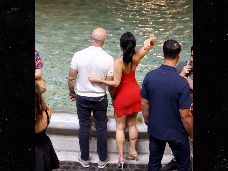 Jeff Bezos, Lauren Sanchez Kiss at Rome’s Trevi Fountain, Make Wish