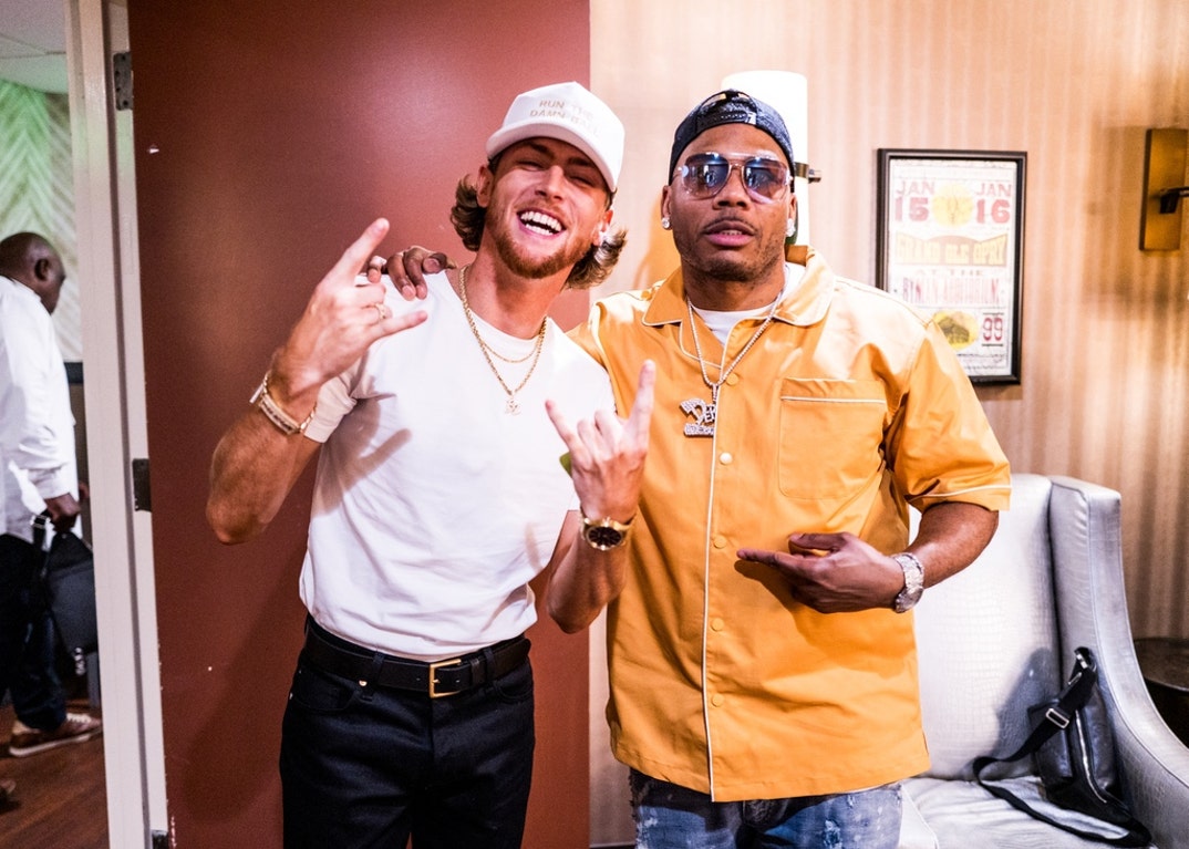 In 2004, Nelly surprised fans with “Over and Over,” a country crossover with Tim McGraw from his hit album Suit. He returned to the genre in 2021 with Heartland, led by “Lil Bit” featuring Florida Georgia Line and guest appearances from Breland, Kane Brown, Darius Rucker, and more.