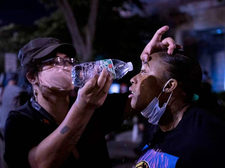 Protesters Fight Through Tear Gas