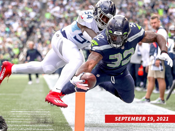 Seahawks RB Chris Carson doesn't practice Wednesday while team continues to  evaluate neck injury