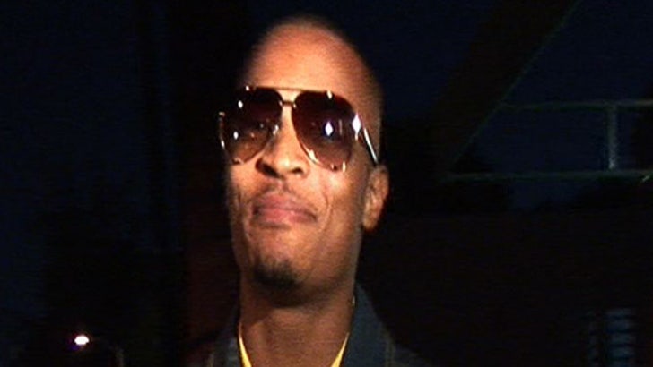 T.I. Nails TMZ Photog ..