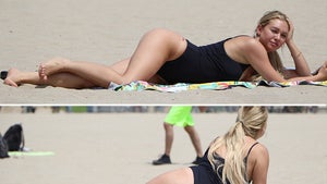 Corinne Olympios Busts Out Her Booty for Beach Day