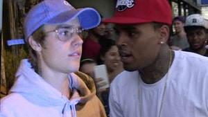 Justin Bieber Defends Chris Brown, Compares Him to Michael Jackson & Tupac