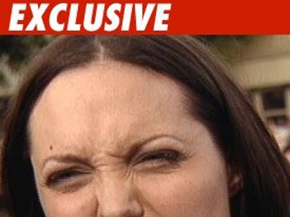0529_jolie_credit_tmz_ex-1