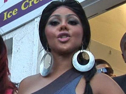 0504-lil-kim-tmz