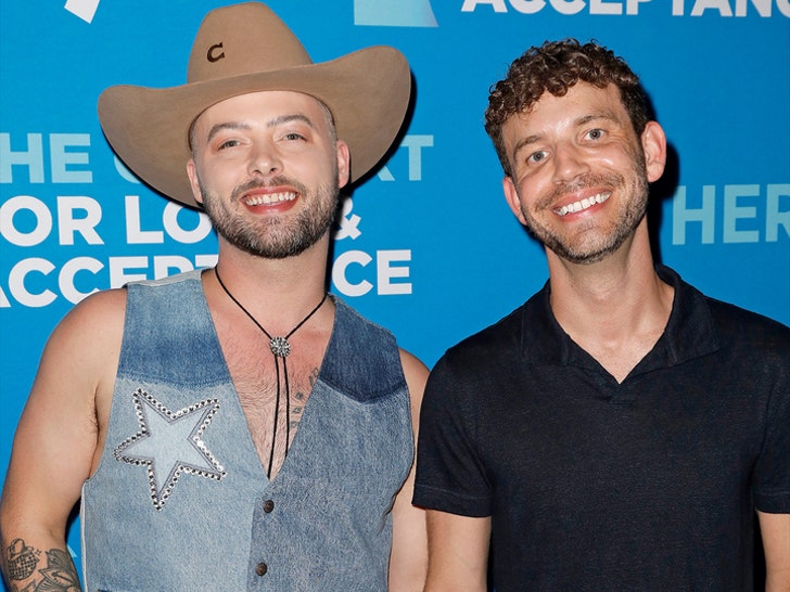 adam_mac_with_his_husband_lee_pfund_getty_1_720