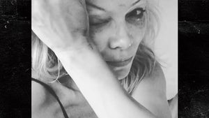 Pamela Anderson Sobbing Through Goodbye Message to Hugh Hefner