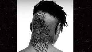 Usher's New Tattoo is Definitely a Head Turner Because It's On His Head