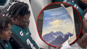 aj brown reading book on sidelines 1 insta 1