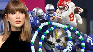 taylor swift seahawks braclet getty comp