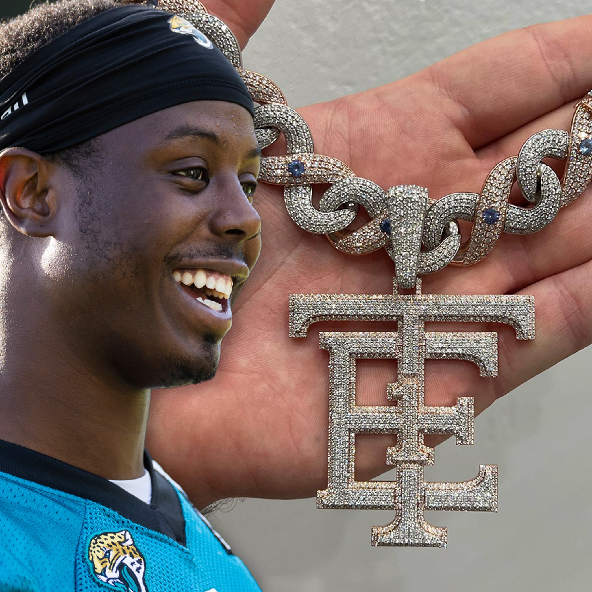 NFL's Travis Etienne Cops 60-Carat Diamond Logo Chain