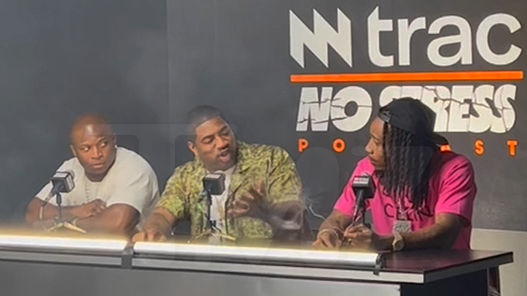DJ Holiday Asks Wiz Khalifa and O.T. Genasis Crazy Questions On Video Set #WizKhalifa