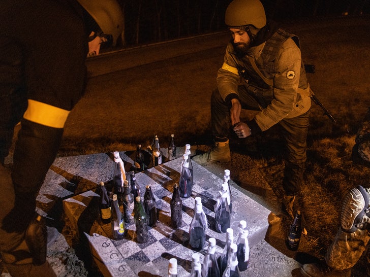 Ukrainian forces playing chess with molotov cocktails