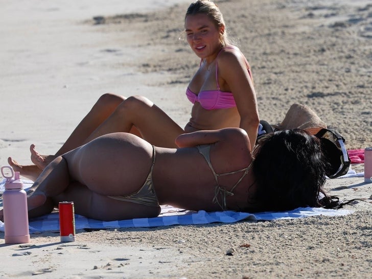 0513-Kylie-Jenner-in-A-Gold-Thong-Bikini-On-Beach-in-Turks-and-Caicos-Primary-4