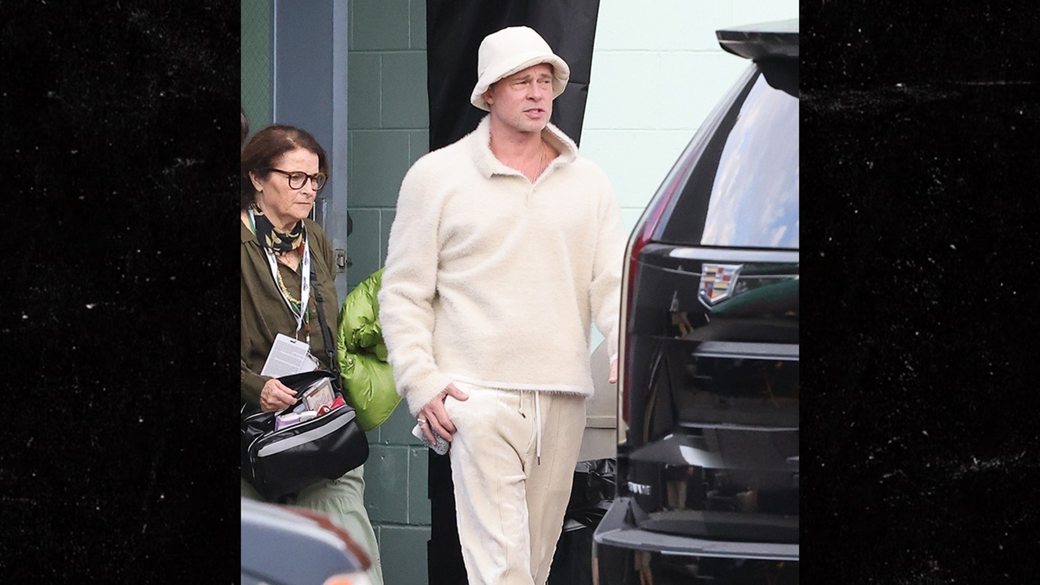 Brad Pitt shows off his Gen Z era look in a Crocs bucket hat