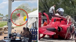 062525_helicopter_lands_by_waterside_restaurant_primary