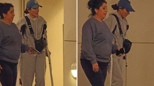 0829-Sandra-Bullock-Injured-on-Crutches-PRIMARY