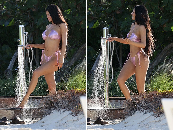Kylie Jenner Hosing Down In Pink Bikini