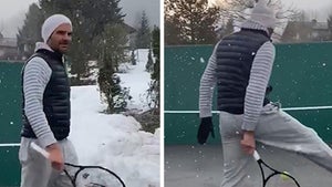 Roger Federer Polishes Tennis Skills With Snowy Trick Shot Session