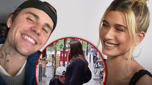 Justin Bieber Kisses Wife Hailey's Pregnant Belly in Japan