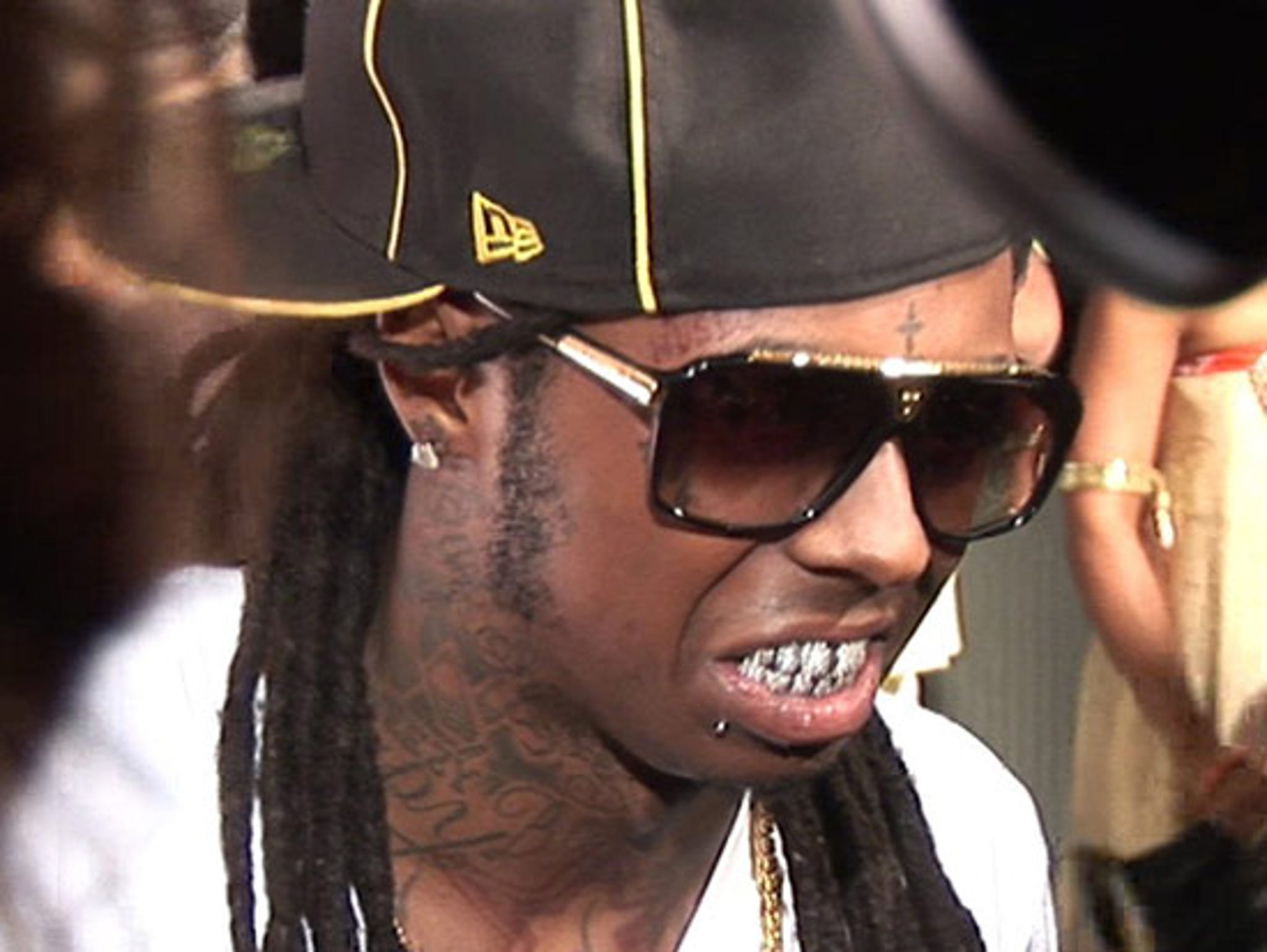 Lil Wayne denies partying with Giants, riffs on Packers love