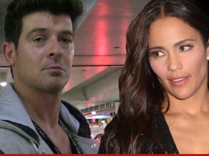 0224-robin-thicke-and-wife-getty-tmz-02