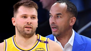 luka doncic and nico harrison getty 3