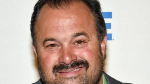 Frank Fritz Smiling With a Green Shirt And Tie