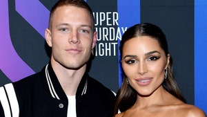 olivia culpo and chrisgtian mccaffrey for baby number 2 getty