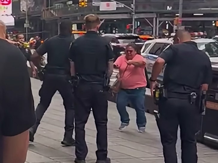 A woman reportedly confronted NYPD officers while holding two knives, shortly after she allegedly stabbed multiple people, according to police reports. The scene remains active