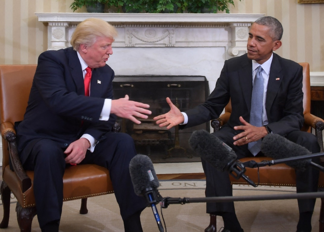U.S. President Barack Obama and President-elect Donald Trump shake hands during a transition planning meeting in the Oval Office at the White House.