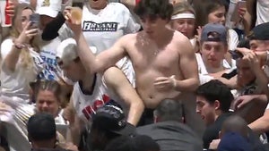 Shirtless Fan Throws Drink On Man In Wild Skirmish At Bryant Vs. Wagner Game