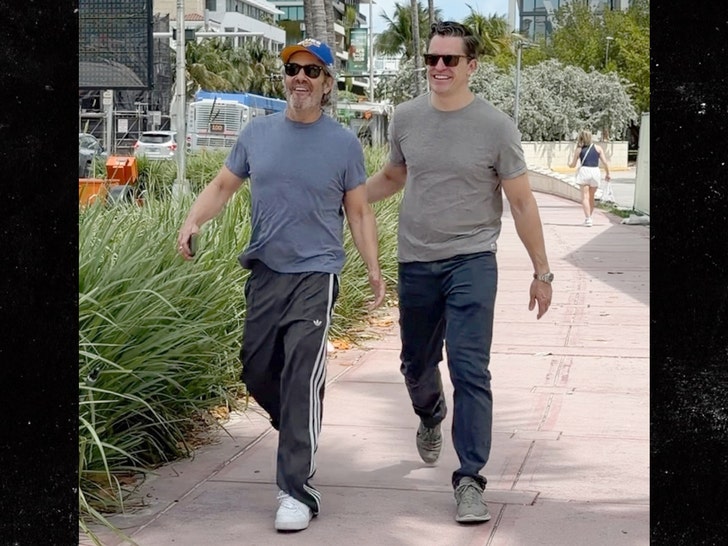 Andy Cohen and Kevin Sobieski are all smiles taking a walk during Miami getaway backgrid 2