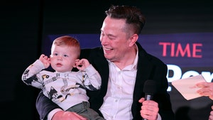 Elon Musk Brings Out Toddler Son, Softens Crowd for TIME Person of the Year Honor