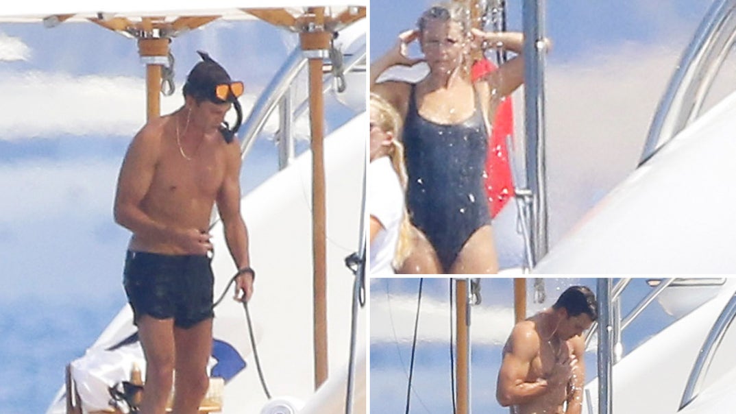 0805-Tom-Brady-Mystery-Woman-Snorkeling-Yacht-France-PRIMARY