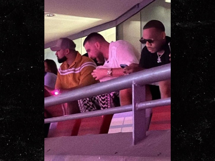 travis kelce at taylor swift concert in singapore