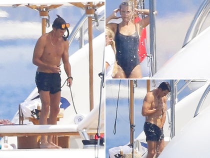 0805-Tom-Brady-Mystery-Woman-Snorkeling-Yacht-France-PRIMARY
