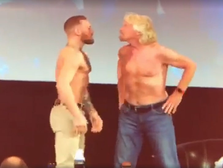 Conor McGregor Has Shirtless Face-Off with Richard Branson :: 0110-conor-mcgregor-richard-branson-shirtless-standoff-facebook-2