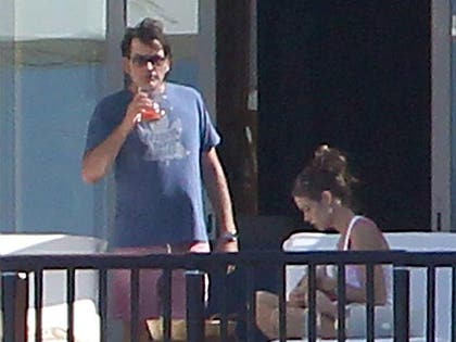 1223_charlie_sheen_brook_mueller_SPLASH