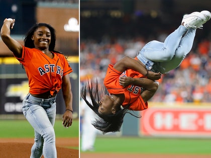 1024 Simone Biles does a flips before throwing out the first pitch getty split 2