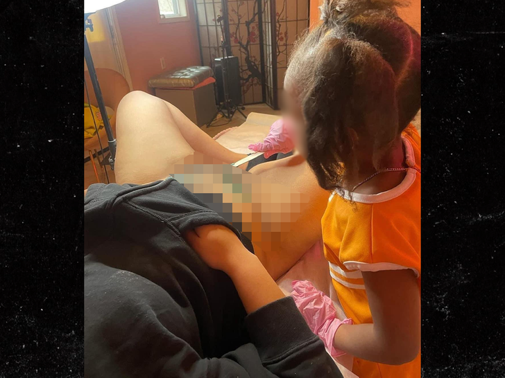 little girl waxing woman