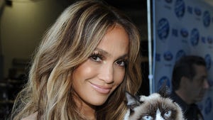 10 Celebrities Pawing Around With Famous Pets -- Who's The Bigger Star?