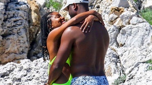 Dwyane Wade and Gabrielle Union Pack on The PDA in France