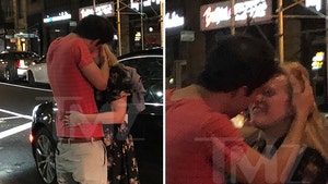 Elisabeth Moss Making Out with Mystery Man in NYC