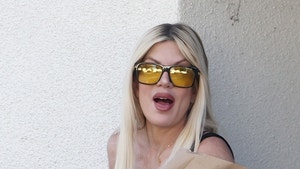 Tori Spelling Shows Off Matching Piercings with Daughter